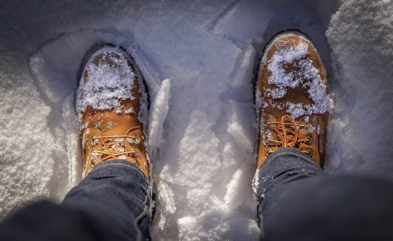 winter boots on snow
