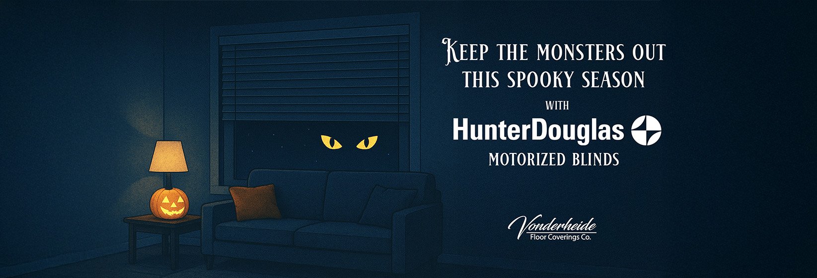 Illustration of a cozy living room at night. Outside the window, glowing orange eyes peer through. Text on the right reads “Keep the monsters out this spooky season with Hunter Douglas motorized shades" at Vonderheide Floor Coverings
